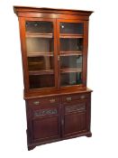 Late Victorian mahogany glazed bookcase on cupboard