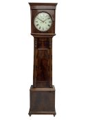 A Scottish mahogany veneered longcase c1820 with a flat top and convex moulding beneath