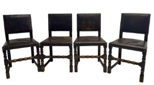 Set of four Jacobean style oak and studded leather dining chairs