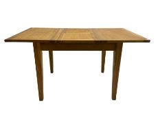 Light oak extending dining table