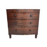 Early 19th century mahogany and mahogany banded bow-front chest