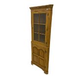 Traditional light oak corner cabinet