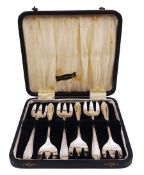 Set of six 1930's silver cake forks