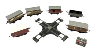 Hornby '0' gauge - three LNER teak style passenger coaches; three goods wagons; CR1 Right Angle Cros
