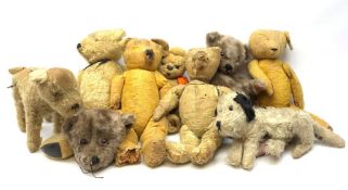 Quantity of early wood wool filled teddy bears for restoration.