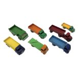 Dinky - seven unboxed and playworn/repainted die-cast commercial vehicles comprising Bedford Articul