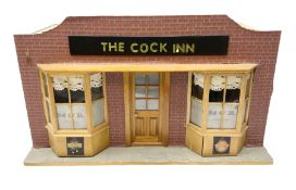 Scratch-built illuminated wooden doll's house type display of 'The Cock Inn' public house