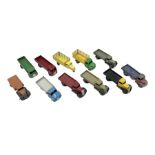 Dinky - eleven unboxed and playworn/repainted early die-cast commercial vehicles including flatbed a