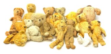 Quantity of early wood wool filled teddy bears for restoration.