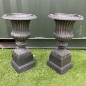 Pair of medium cast iron bronze finish garden urns