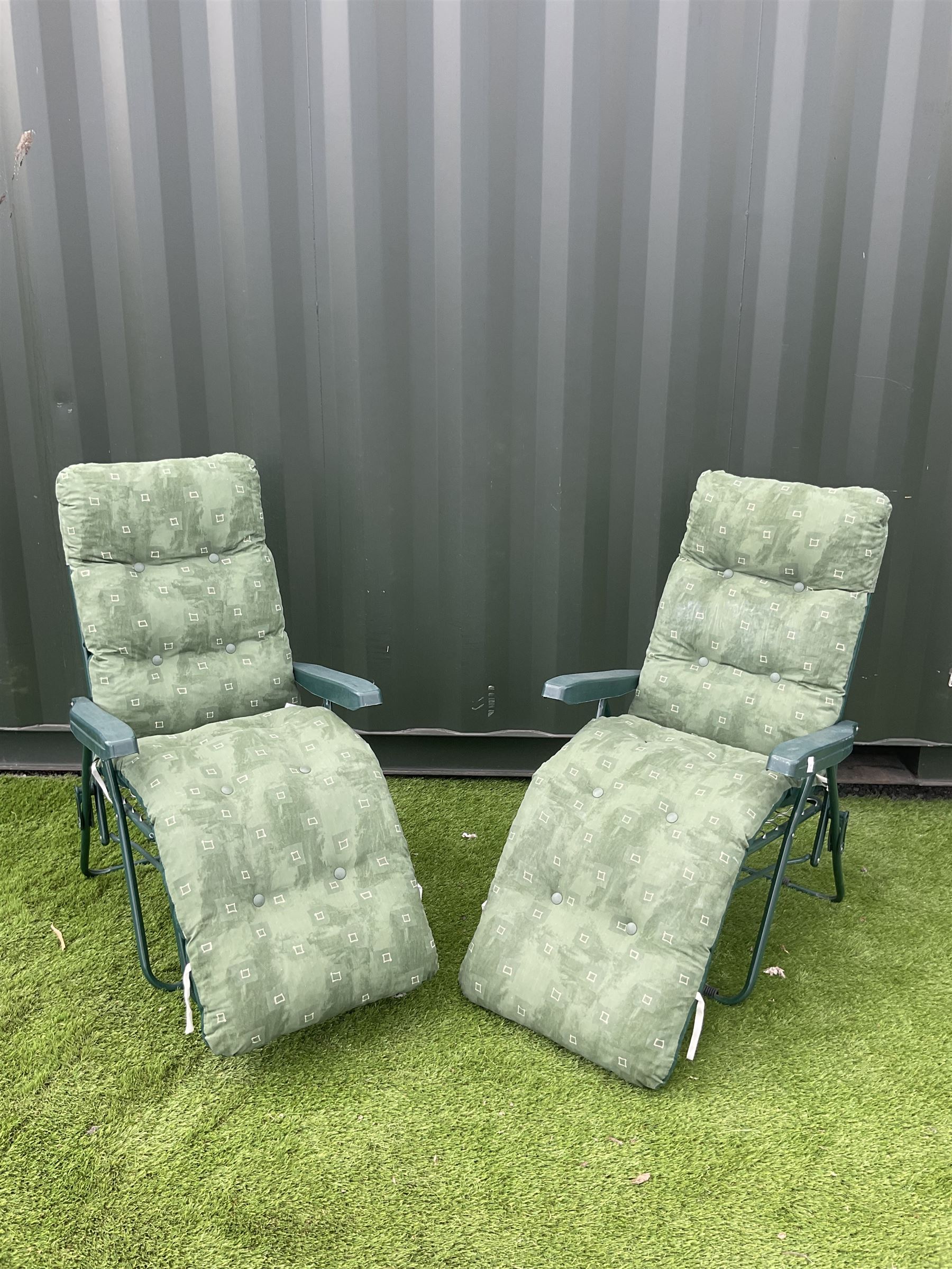Pair of metal garden relaxer chairs