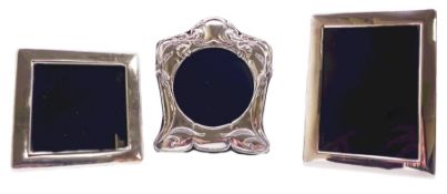 Three modern silver mounted photograph frames