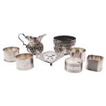 Group of five mid 20th century silver napkin rings