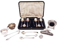 Set of six Edwardian silver Albany pattern coffee spoons and pair of sugar tongs