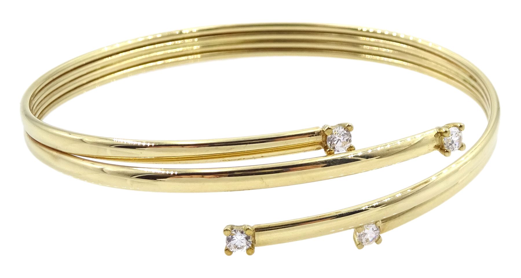 9ct gold four stone cubic zirconia bangle