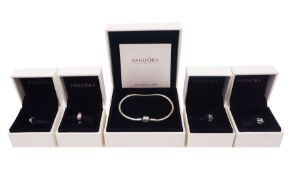 Silver Pandora bracelet and four silver Pandora charms