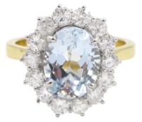 18ct gold oval aquamarine and round brilliant cut diamond cluster ring