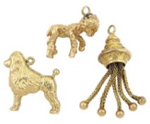 Three 9ct gold pendant/charms including poodle