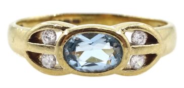 9ct gold blue topaz and cubic zirconia ring