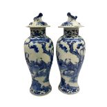 Pair of later 19th century Chinese blue and white vases and covers of baluster form