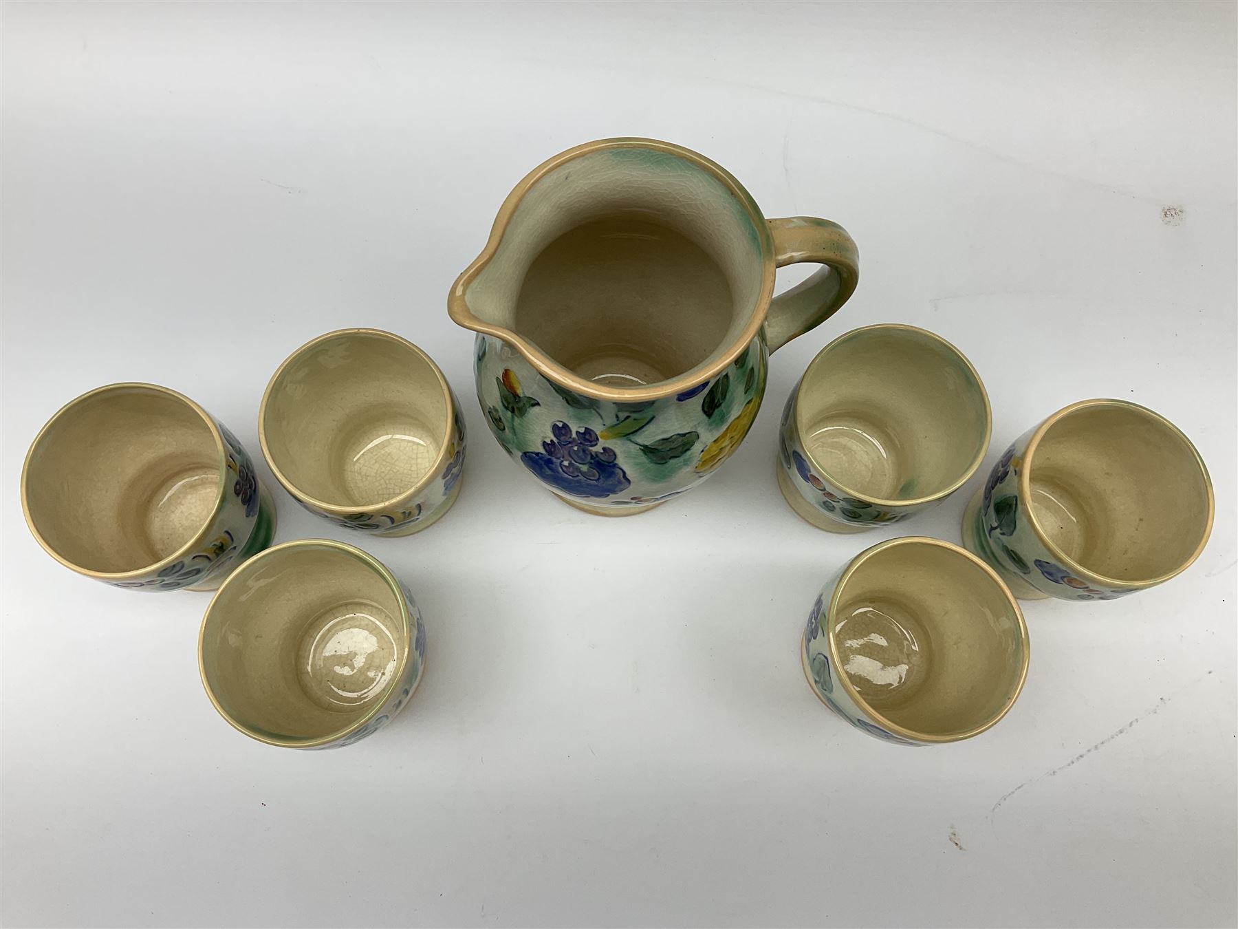 Early 20th century Royal Doulton Brangwyn Ware jug and set of six beakers - Image 6 of 7