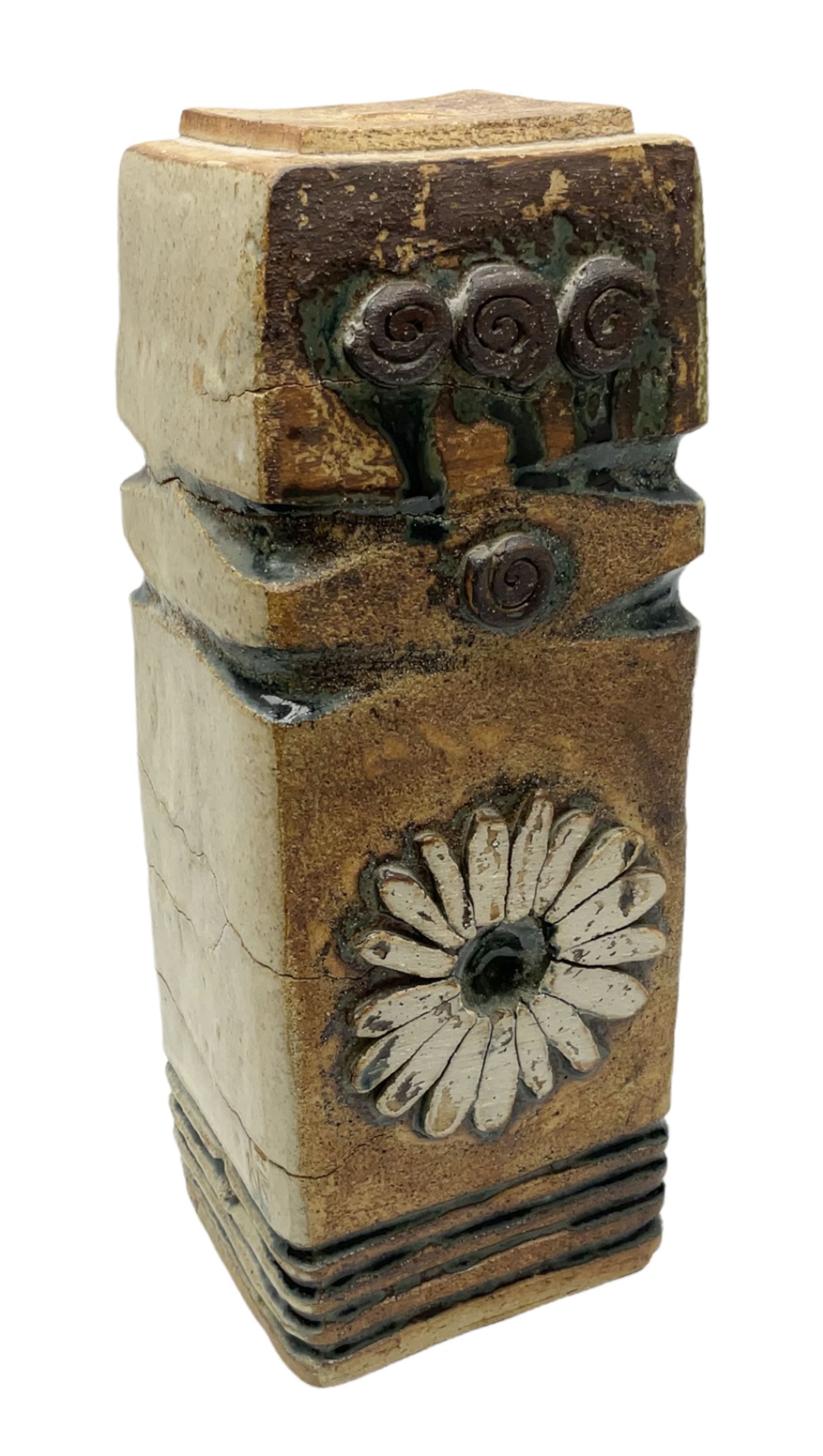 Studio pottery table lamp of slab built and moulded form with applied floral and abstract motifs