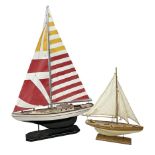 Wooden kit built model yacht with sails and mounted on wooden base