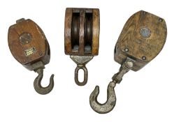 Three ship pulleys comprising wooden block double with stiff swivel hook