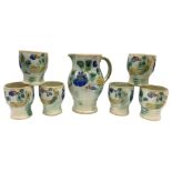 Early 20th century Royal Doulton Brangwyn Ware jug and set of six beakers