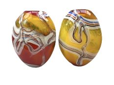 Pair of heavy art glass vases of ovoid form with marbled design on merging yellow