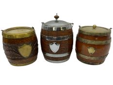 Three 20th century oak tobacco jars in the form of barrels