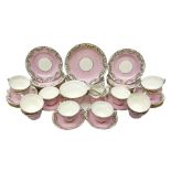 Late 19th/early 20th century Delphine Crown China tea service for twelve decorated with floral and g