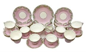 Late 19th/early 20th century Delphine Crown China tea service for twelve decorated with floral and g