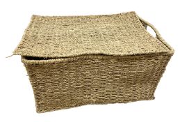 Woven basket of rectangular form with hinged lid