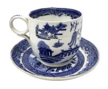 19th century English blue and white transfer large novelty teacup and saucer decorated with willow p