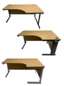 Light oak finish right hand desk on silver finish supports (W160cm