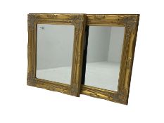 Pair of small gold finish classical wall mirrors