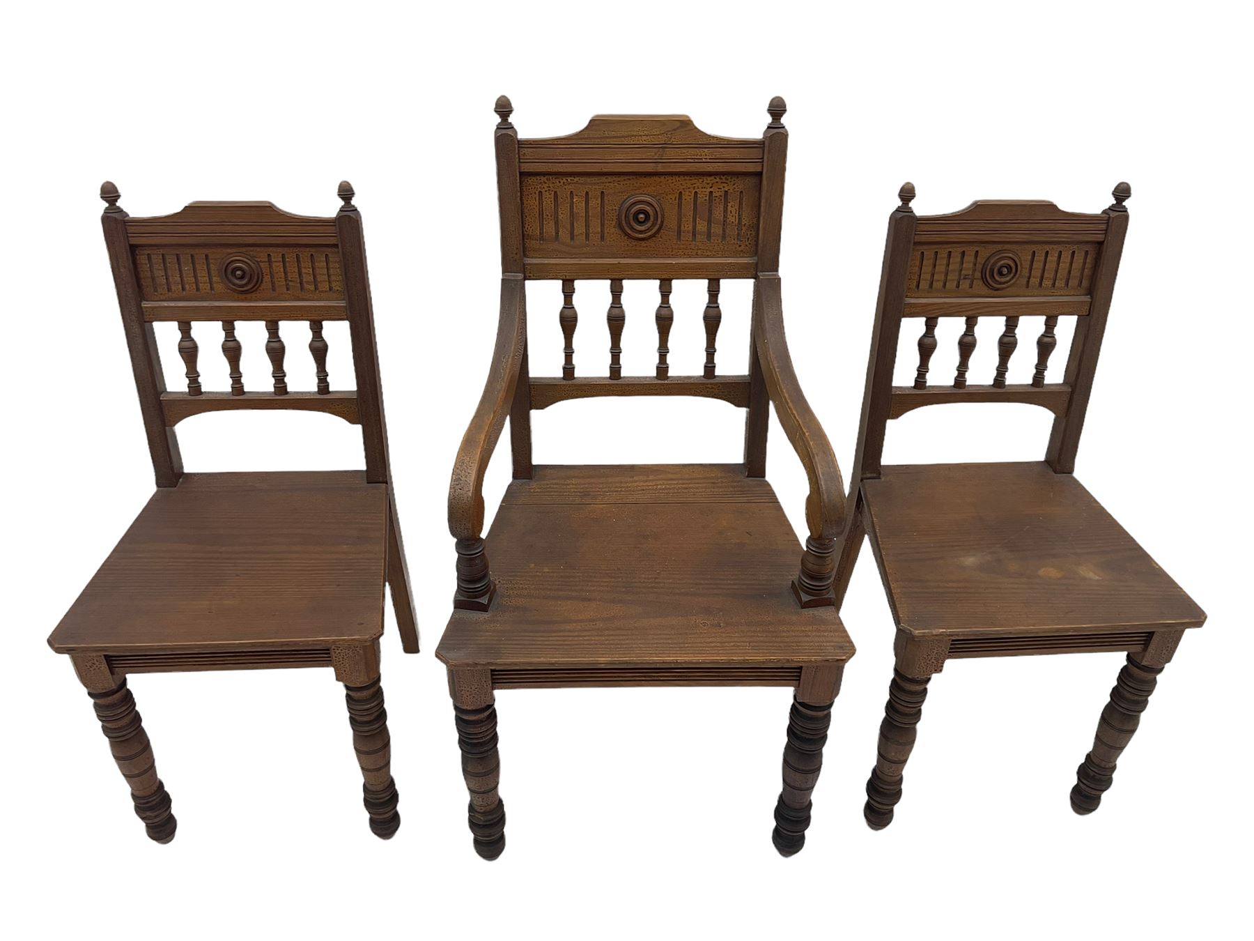 Victorian Gothic revival pitch pine armchair and pair of matching chairs