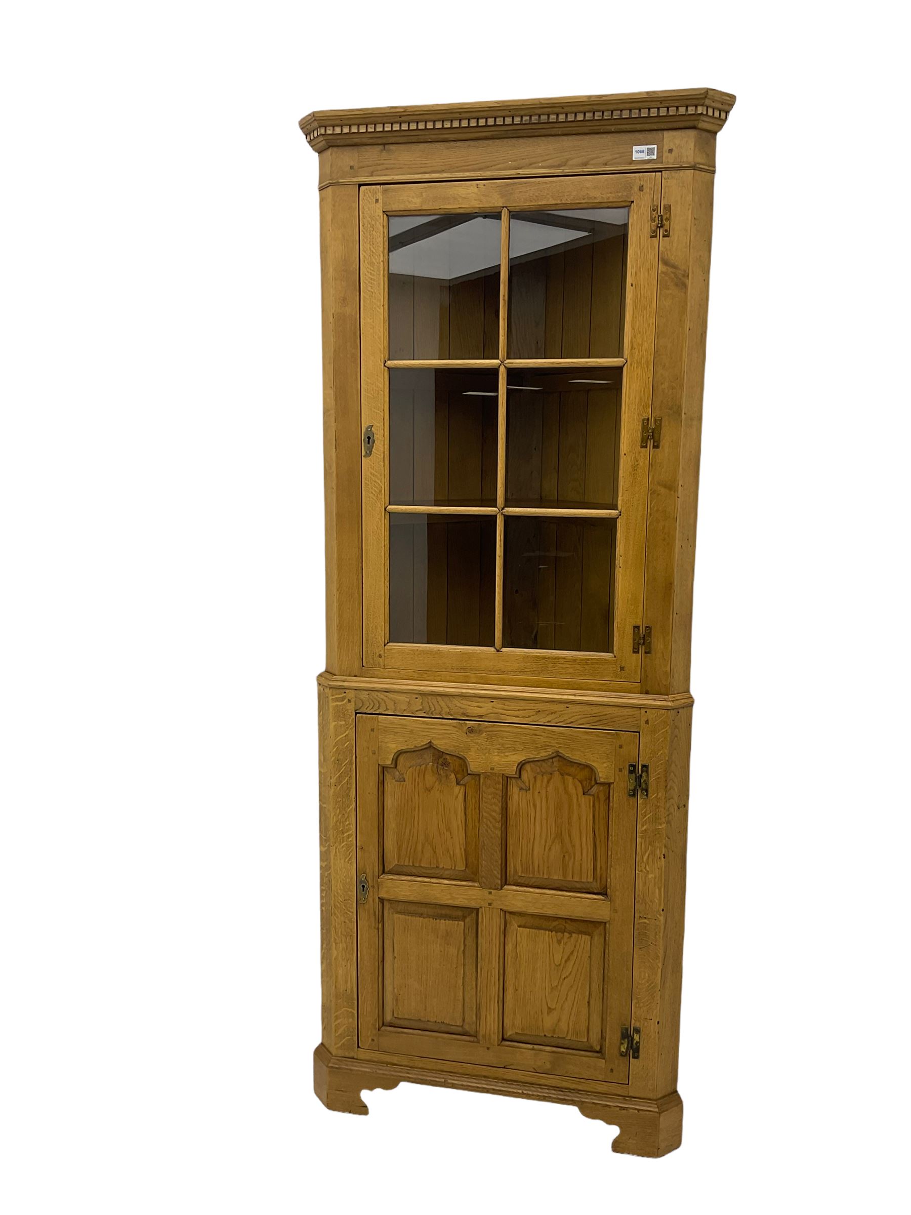 Traditional light oak corner cabinet