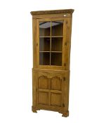 Traditional light oak corner cabinet