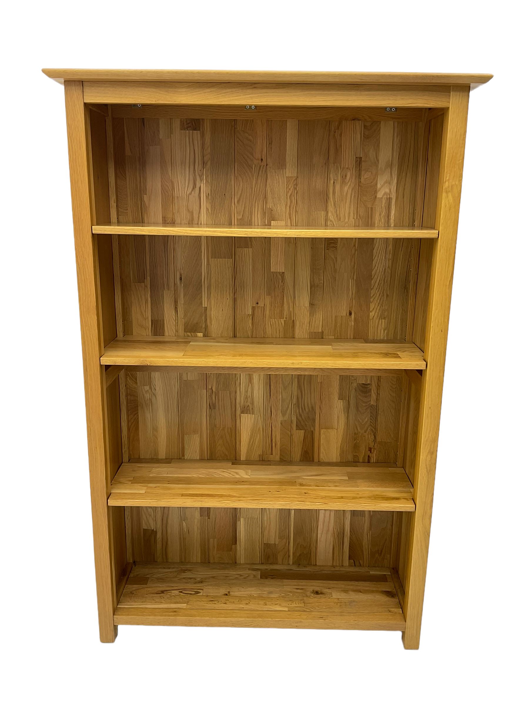 Light oak bookcase with three adjustable shelves