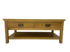 Light oak coffee table fitted with two drawers and undertier