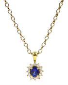 18ct gold oval sapphire and round brilliant cut diamond pendant