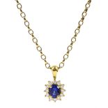 18ct gold oval sapphire and round brilliant cut diamond pendant