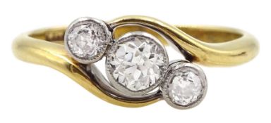 Early 20th century gold milgrain set three stone old cut diamond ring