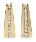Pair of 9ct gold channel set diamond half hoop earrings
