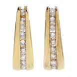 Pair of 9ct gold channel set diamond half hoop earrings