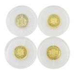 Four gold 'World's Smallest Coins'