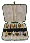 Set of six early 20th century Norwegian silver gilt and enamel coffee spoons