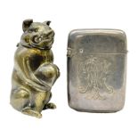 Victorian novelty brass vesta case modelled in the form of a pig holding a money bag